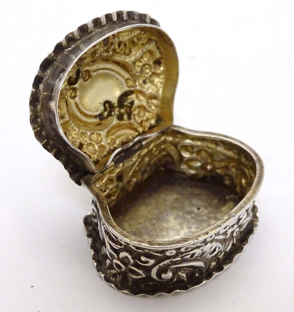 A Victorian silver small box with embossed decoration. - Image 6 of 7