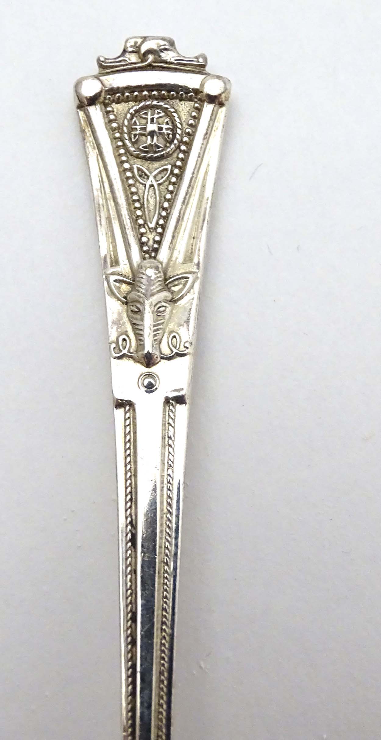 A cased set of 6 silver teaspoons having unusual celtic like decoration with wild boar head detail. - Image 6 of 13