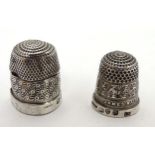 A Silver thimble titled ' James Walker The London Jeweller' and hallmarked Chester 1924 maker James