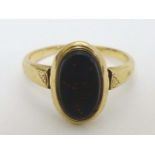An 18ct gold ring set with bloodstone CONDITION: Please Note - we do not make