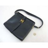 A Vintage ladies black Vimas? Paris made in France handbag with gilt hardware CONDITION: