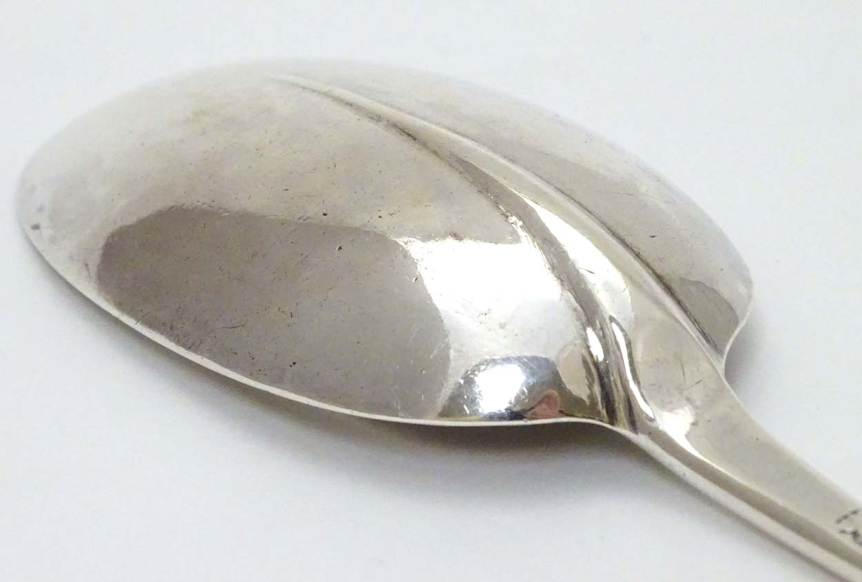A Queen Anne Britannia Standard silver Hanoverian table spoon with rat tail bowl. - Image 2 of 13