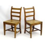 A pair of early 19thC ash side chairs of peg jointed construction,