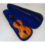 Musical Instruments : A cased Stentor 'Student' violin with bow and cheekpiece,