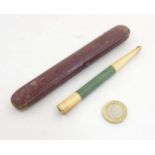An early 20thC ivory shagreen and 9ct gold ( marked) ladies long cigarette holder / mouthpiece )