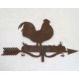 Weather Vane : An old weather vane top in the form of a rusted Cockeral ,