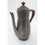 Art Nouveau : BCM / Tudric - A plannished melon sided pewter coffee pot with caned handle,