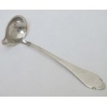 Scandinavian Silver : A Danish silver cream ladle with hammered decoration. Copenhagen c.