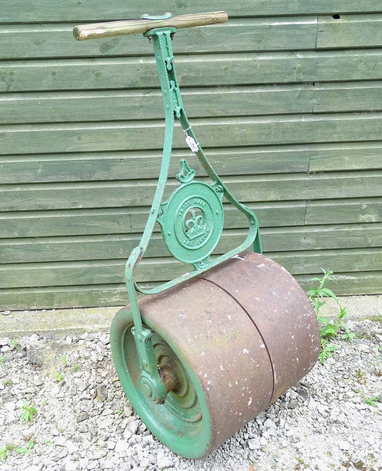 Garden and Architectural Salvage : an early 20 thC painted ' New Crown ' cast Iron Garden roller,