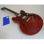 Musical Instruments: A cased Gibson USA 'ES335' semi-hollow body electric guitar,