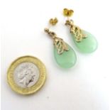 A pair of yellow metal drop earrings set with jade drops 1" long CONDITION: Please
