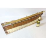 A scale ship lapped constructed model sail boat, the hull titled ' Love and Peace ' .