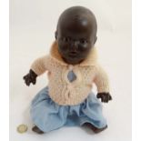 Armand Marseille : an all brown composition character baby doll,