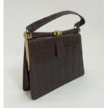A vintage crocodile effect leather brown ladies single handle handbag,
