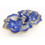 A Victorian Flow Blue Ironstone two section handled Staffordshire bowl depicting roses with gilt