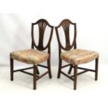 A pair of late 18hC mahogany Hepplewhite style side chairs,