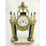 Marble Portico Clock : an Egyptian Revival white marble , Ebonised wood and brass 8 day clock ,