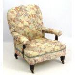 A Victorian nursing chair with turned supports and legs,