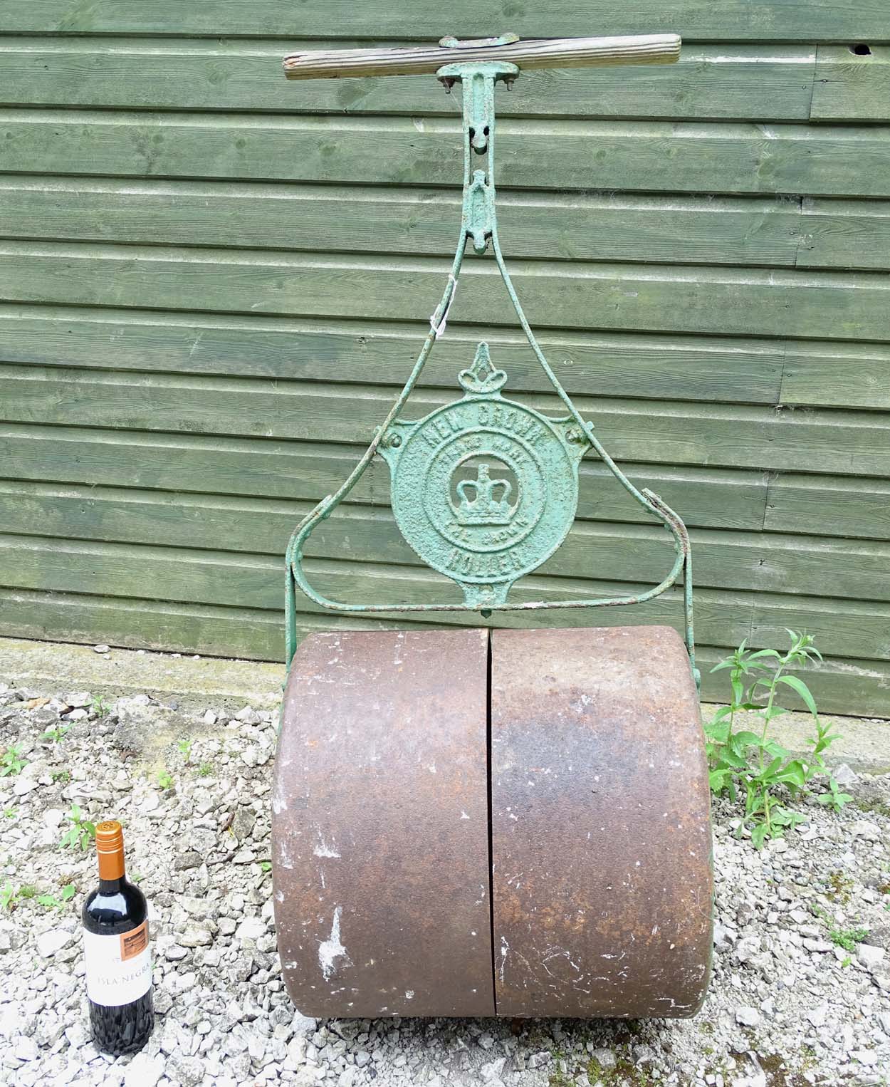 Garden and Architectural Salvage : an early 20 thC painted ' New Crown ' cast Iron Garden roller, - Image 2 of 7