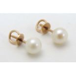 A pair of pearl stud earrings with Russian 14ct gold mounts CONDITION: Please Note