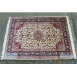 Rug Carpet : A late 20 thC machine made Keshan Carpet with beige ground ,
