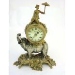 Elephant Clock : an Italian Brevettato brass & bronze elephant mantel clock The top surmounted by a