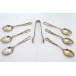 A cased set of 6 silver teaspoons hallmarked 1915 together with sugar tongs hallmarked Birmingham