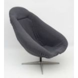 Vintage Retro : A 1960's 'Lura shell' swivel chair with squared pattern upholstery ,
