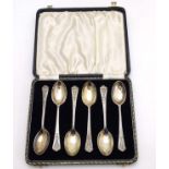 A cased set of 6 silver teaspoons having unusual celtic like decoration with wild boar head detail.
