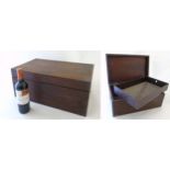 A 19thC mahogany brass cornered large lidded box with lift out tray and campaign handles,