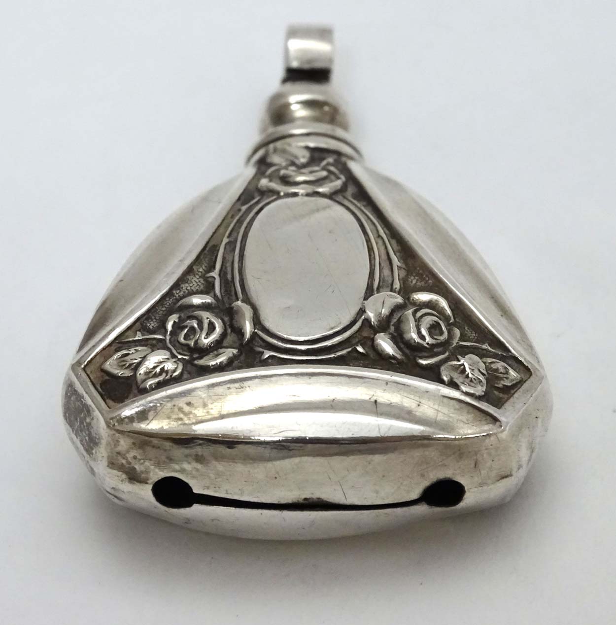 A Continental 800 silver pendant rattle with rose decoration 2 1/4" long CONDITION: - Image 4 of 5