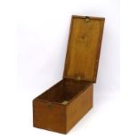 An early 20thC teak box with unusual brass opening mechanism allowing the lid to hinge from either