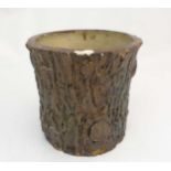 A 20thC ceramic tree log planter, 10'' high,