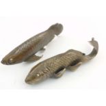 A pair of 21stC bronze models of hollow fish. formed as a cat fish and carp.