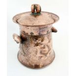 Arts and Crafts / Art Nouveau : A planished copper coal bin and lid with embossed decoration.