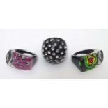 3 various Retro Mid Century rings including lucite examples with neon decoration.
