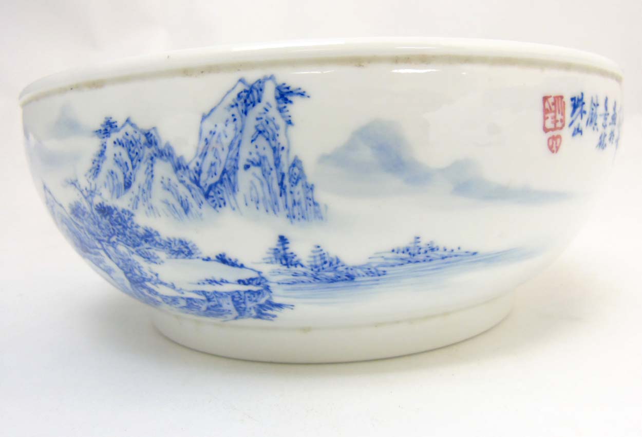 A Chinese blue and white bowl decorated in an underglaze blue continuous landscape and iron red - Image 5 of 8