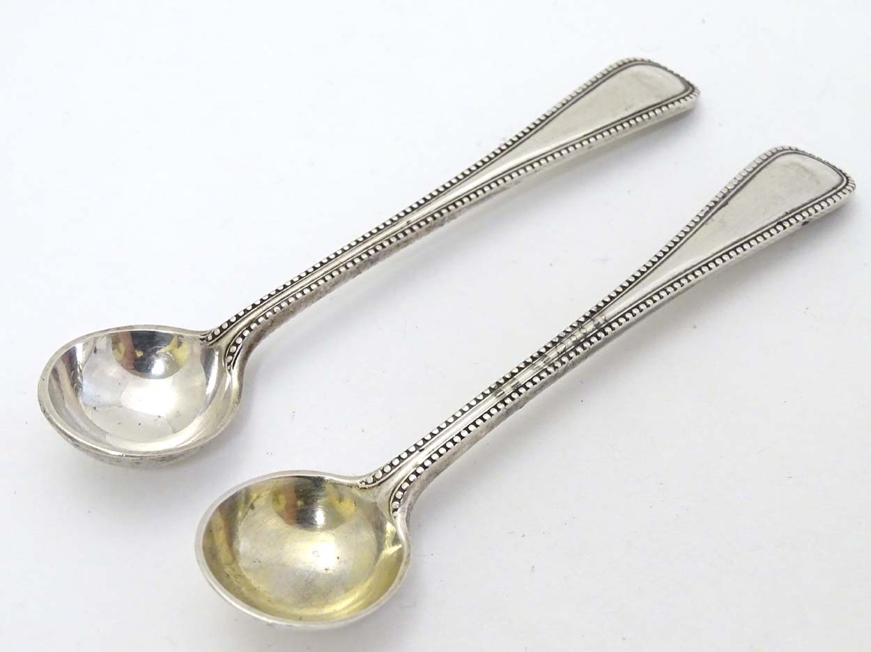 A pair of Victorian silver bead edge salt spoons hallmarked London 1886 maker John Aldwinckle & - Image 4 of 5