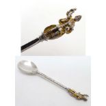 A silver spoon titled King Arthur, the handle surmounted by image of King Arthur.