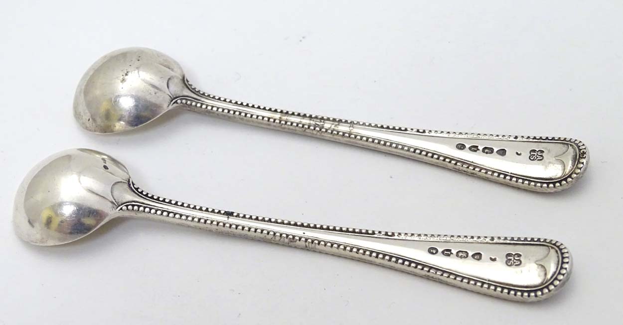 A pair of Victorian silver bead edge salt spoons hallmarked London 1886 maker John Aldwinckle & - Image 5 of 5