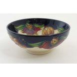 A Moorcroft ' Anna Lilly ' bowl by Nicola Slaney, makers mark to base 2 3/4'' high,