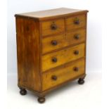 A mid / late 19thC elm chest of drawers, comprising two short over three long drawers,