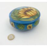 A Limited edition Moorcroft Sunburst circular lidded pot in Sunflower pattern by Vicky Lovatt ,