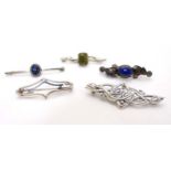 5 various silver and white metal brooches to include one set with lapiz lazuli cabochon.
