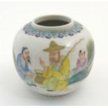 A Chinese Famille Verte ginger jar / pot, depicting a scene with three generations of men fishing,
