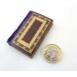 Sewing / needlework : A 19thC Tonbridgeware stick ware inlaid needle case with velvet spine 2 1/4"