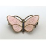 Scandinavian Silver : A Norwegian silver gilt brooch formed as a butterfly with pink guilloche
