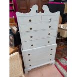 A French grey painted short chest on chest, comprising two over six drawers, approx.