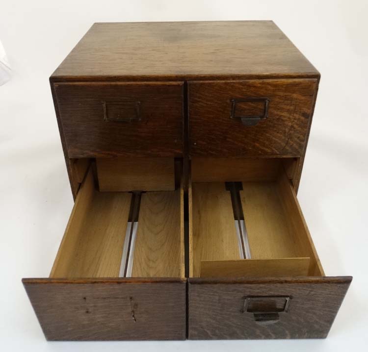 An early 20th C oak four drawer table top filing cabinet, with sliding sections within, - Image 5 of 7