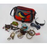A handbag with bird decoration together with costume jewellery contents CONDITION: